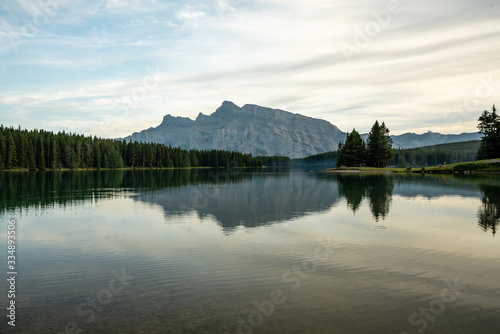 Image of Mountain Landscape with calm water showing reflection of mountains