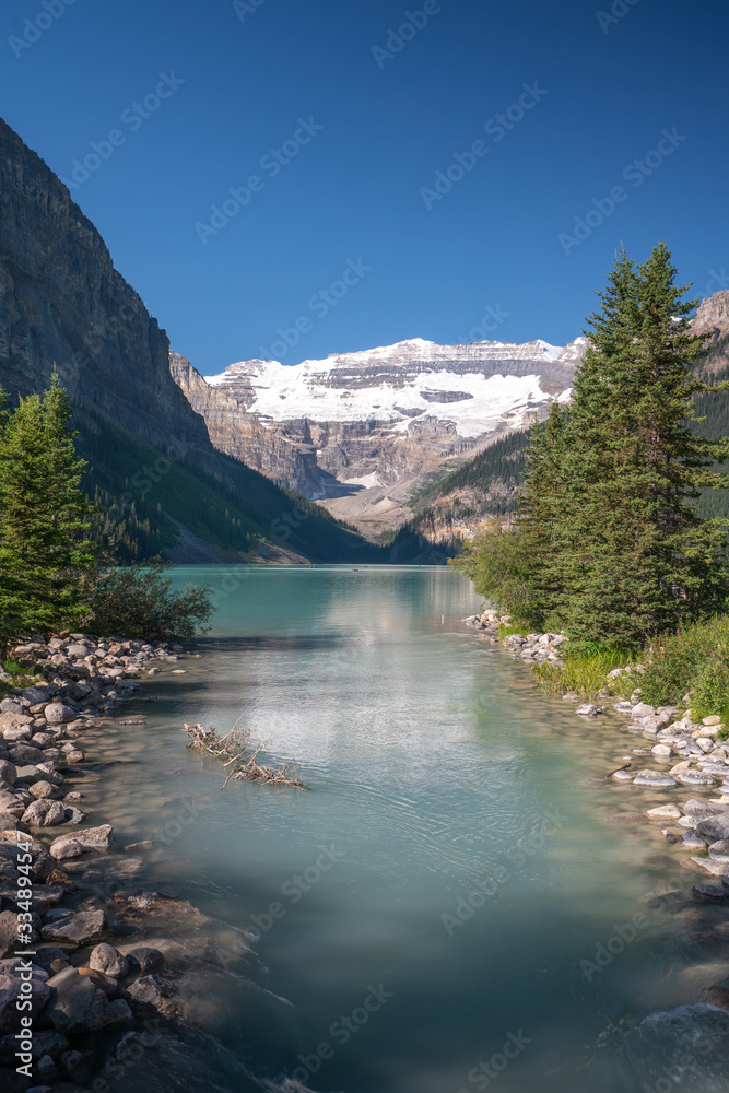 Image of Beautiful Lake Louise with Mountains covered in snow in Banff National Park 