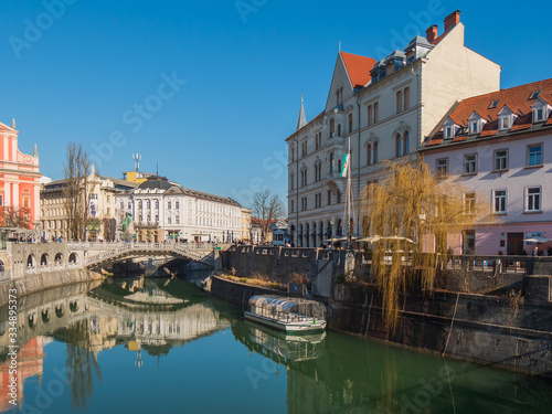 Ljubljana - capital city of Slovenia, center streets, square, church architecture, bridge Tromostovje