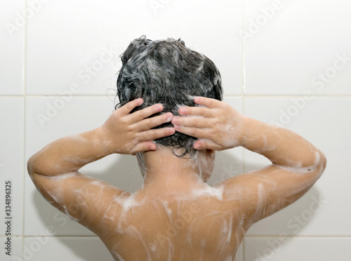 A girl washing her hair.
