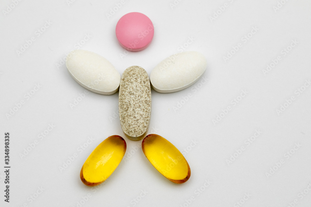 silhouette of a little man. man made of pills. silhouette of a little man. man made of pills.