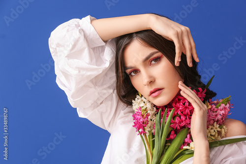 Beautiful young woman with ...