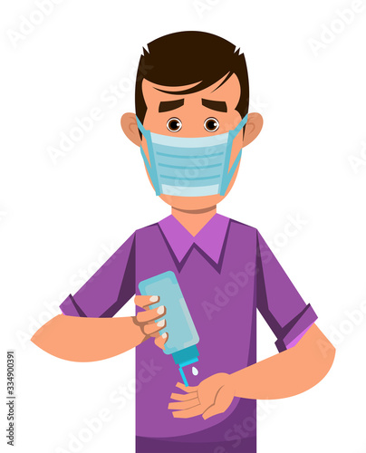 boy wear mask and sanitizing hands with sanitizer gel