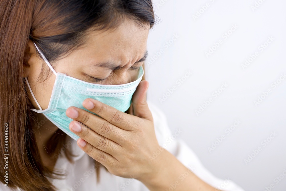 Health concepts, women wearing masks She is sick and has a fever. Due to getting a virus or caused by a weak body. Health concepts, women wearing masks She is sick and has a fever. Due to getting a virus or caused by a weak body.