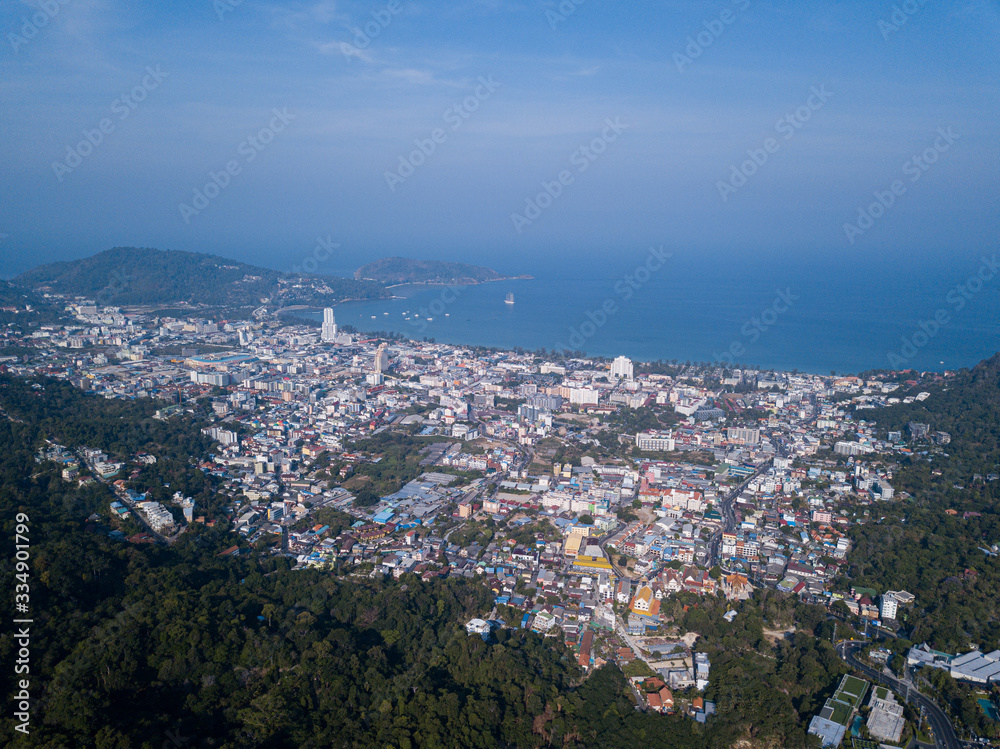 Panorama of Patong, Phuket. Aerial view of the sea bay and the city surrounded by mountains Panorama of Patong, Phuket. Aerial view of the sea bay and the city surrounded by mountains