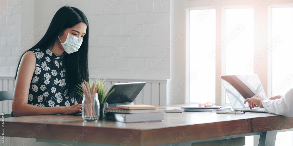 Businesswoman with protective mask working from home. Businesswoman with protective mask working from home.