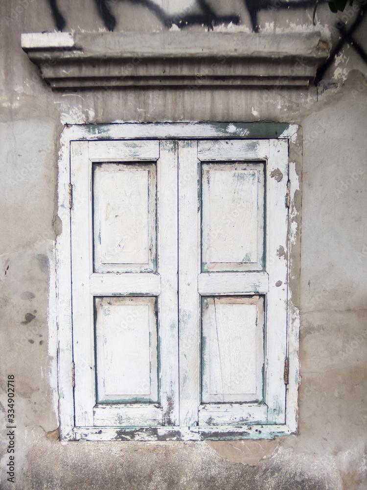 Ancient abandoned buildings with wooden doors and windows. Ancient abandoned buildings with wooden doors and windows.