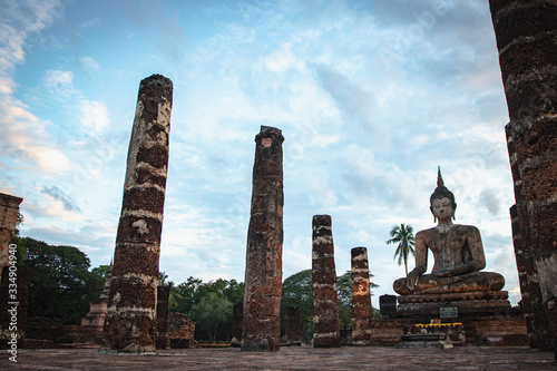 Ancient Buddha statues at Wat Mahathat, Sukhothai, Thailand. Sukhothai Historical Park is the UNESCO world heritage.