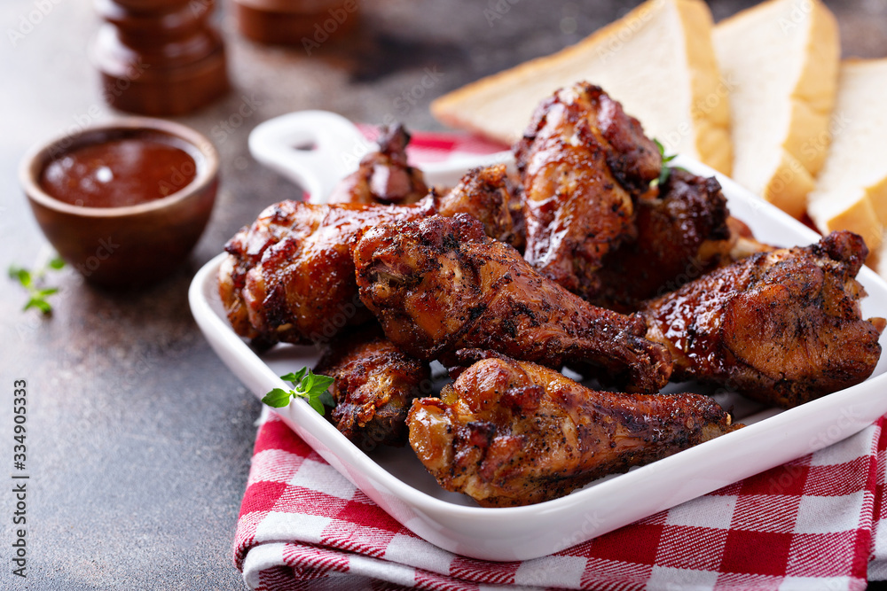 Crispy barbeque chicken wings with bbq sauce Stock Photo | Adobe Stock