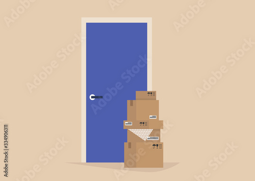 Contact free delivery, packages left next to the entrance, social distancing concept