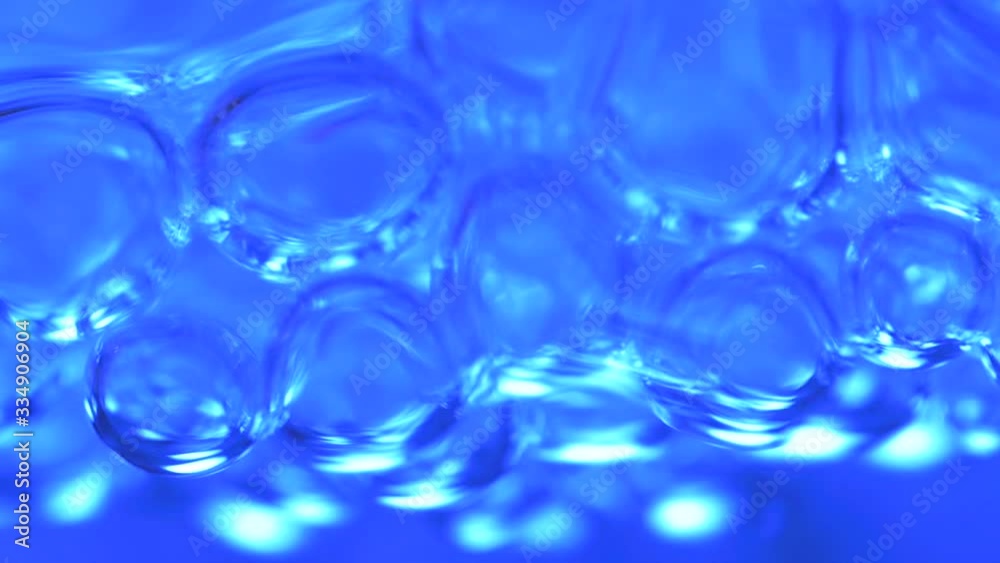 Medical Technology bubbles small blue orbs in the water. Medical Technology bubbles small blue orbs in the water.