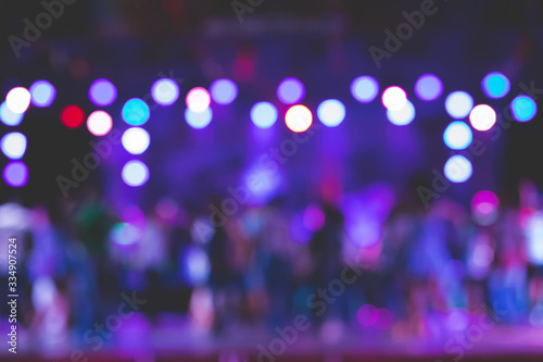 Beautiful blurred images of stage performances at night with lights from a variety of beautiful spotlights.