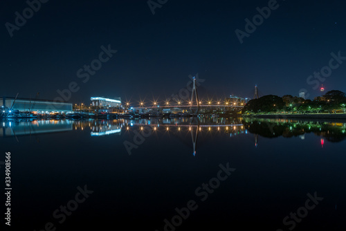Mirror reflections of Anzac bridge at night in Sydney  Australia 