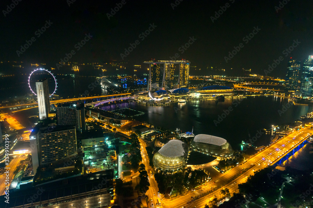 Φωτογραφία Aerial view of Singapore business district and city at twilight in Singapore, As