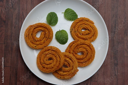 Chakali, murukoo, spiral maharashtrian snack made with gram flour photo