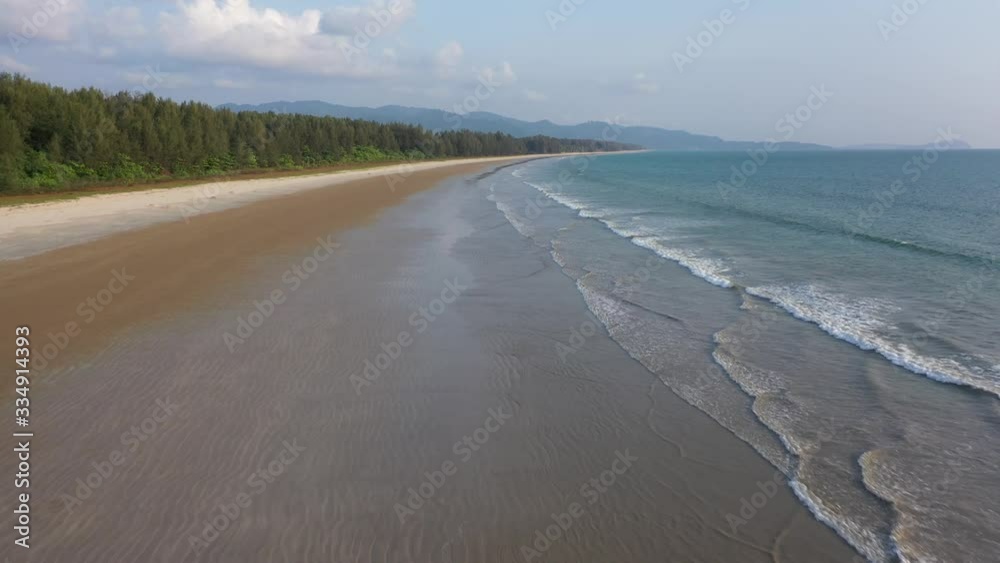 Aerial drone view of a deserted tropical beach in Thailand during the high season. The Coronavirus Pandemic has decimated the Thai tourist industry. Aerial drone view of a deserted tropical beach in Thailand during the high season. The Coronavirus Pandemic has decimated the Thai tourist industry.