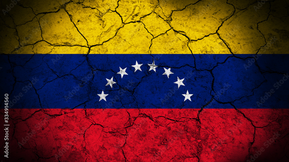 Venezuela flag on the cracked background texture. 