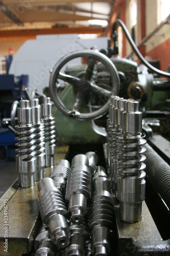 Old lathe in the workshop. Metalworking.