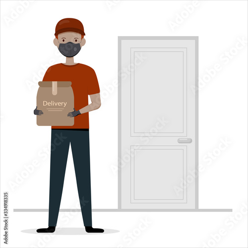 A courier in uniform, a medical mask and gloves delivers the order to the door. Quarantine Delivery Services