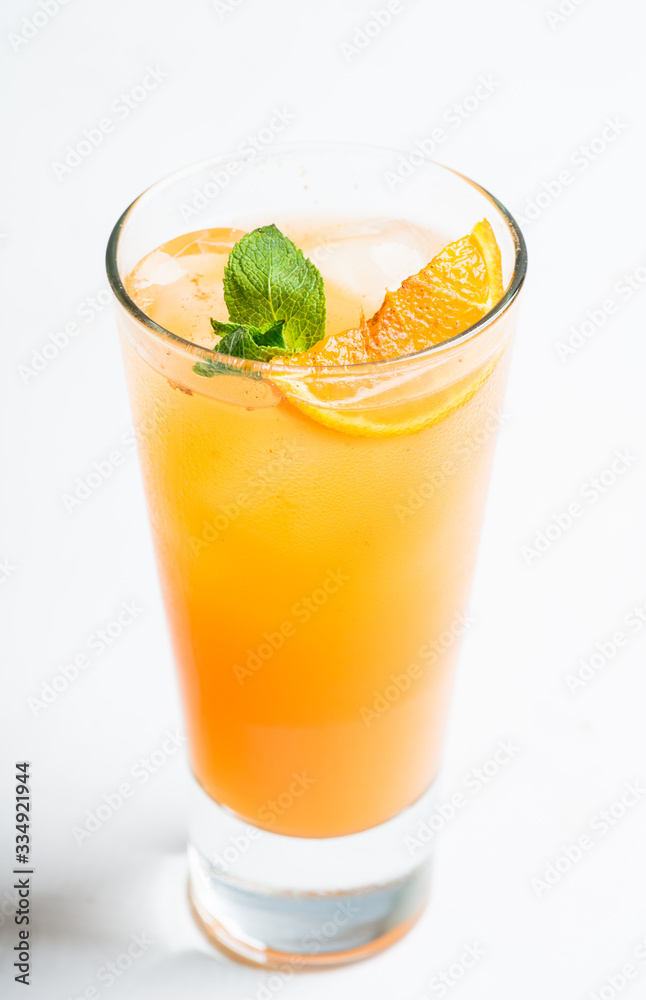 Fresh cocktail with vodka and orange juice on the rustic background. Selective focus. Shallow depth of field. Fresh cocktail with vodka and orange juice on the rustic background. Selective focus. Shallow depth of field.