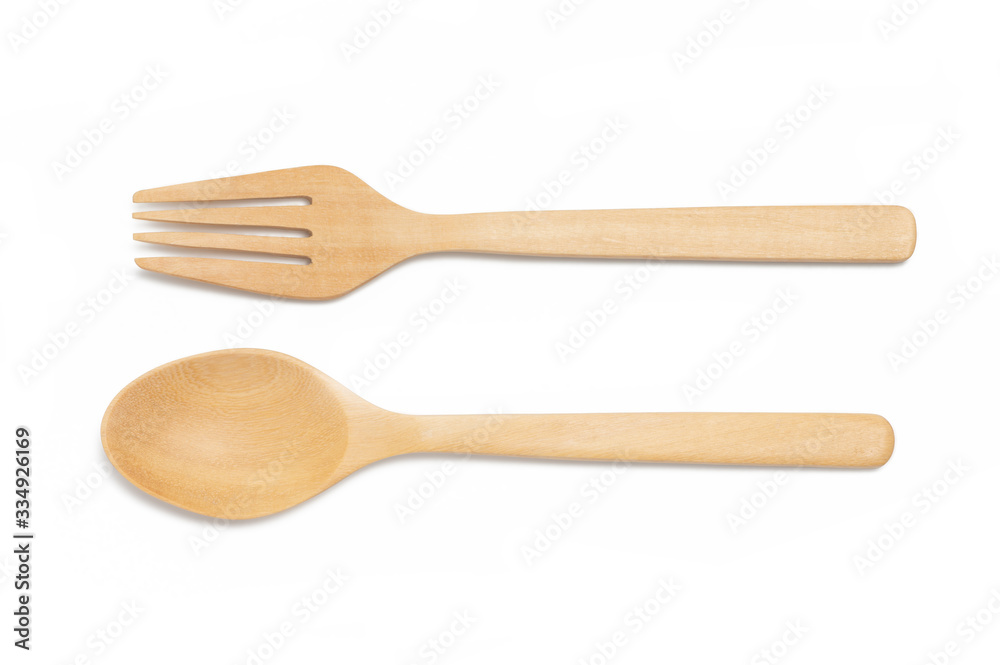 Wooden spoon and fork isolated on white background with clipping path Wooden spoon and fork isolated on white background with clipping path