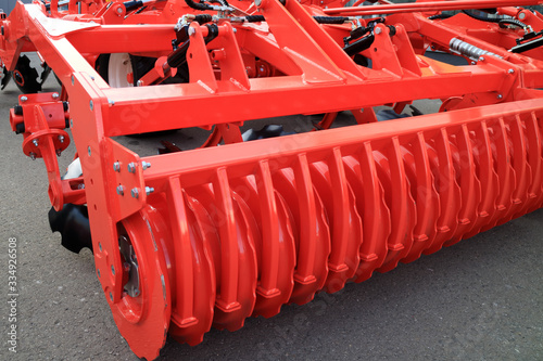 Parts and components of agricultural machines. Plough. Harrow. Cultivator. Fragment. © PhotoBetulo