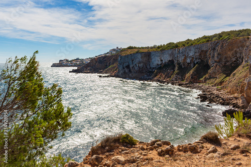 View of the cliffs of the Montgri Natural Park with the tip of Cala Mongo in the background. Costa Brava, Catalonia, Spain