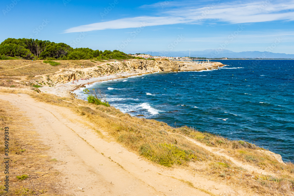 View of the coastal path that runs through the Montgri Natural Park. Costa Brava, Catalonia, Spain