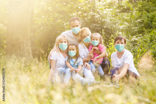 family in protective mask, medical mask to prevent air pollution, fine dust, smog, illness from dust allergy