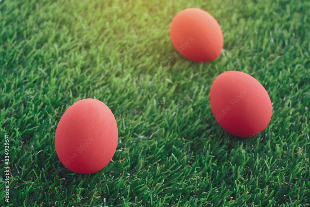 red easter egg on lawn green grass artificial, image of morning springtime concept red easter egg on lawn green grass artificial, image of morning springtime concept