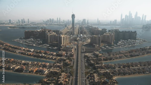 Aerial shot of the Palm Jumeirah island and coastal Dubai skyline, UAE photo