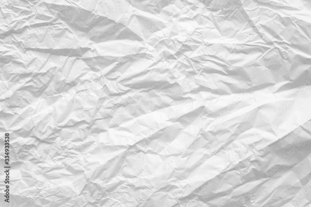 Fototapeta premium White crumpled paper abstract background texture