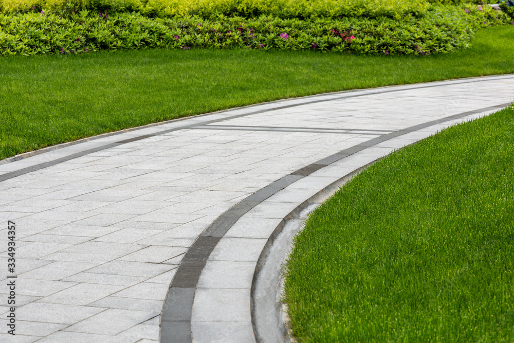 Pathways with green lawns, Landscaping in the garden,Top view of curve ...
