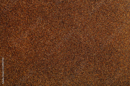Brown glitter texture. Christmas background.