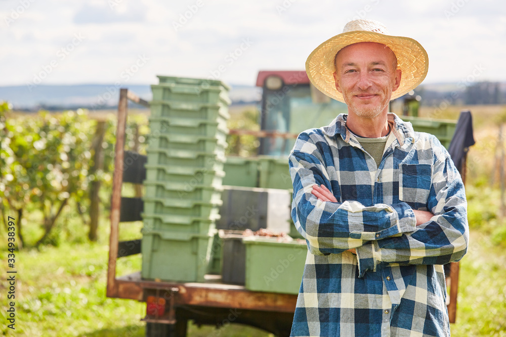 Successful winegrower with crossed arms
