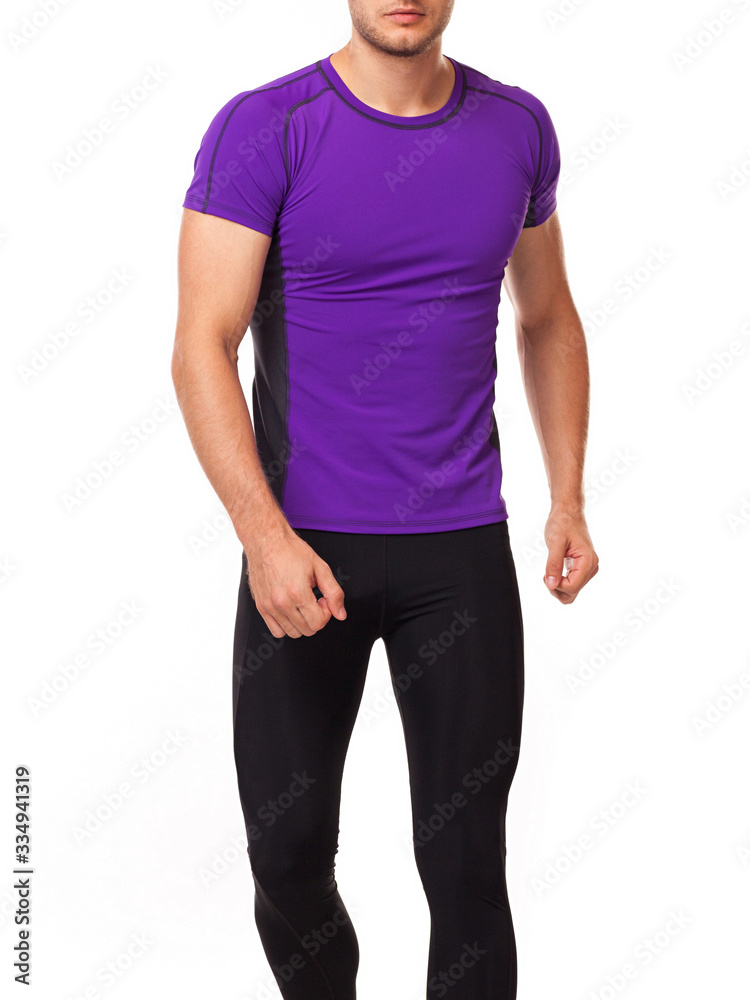 Аthlete in a purple sports t-shirt plays sports on a white background Аthlete in a purple sports t-shirt plays sports on a white background