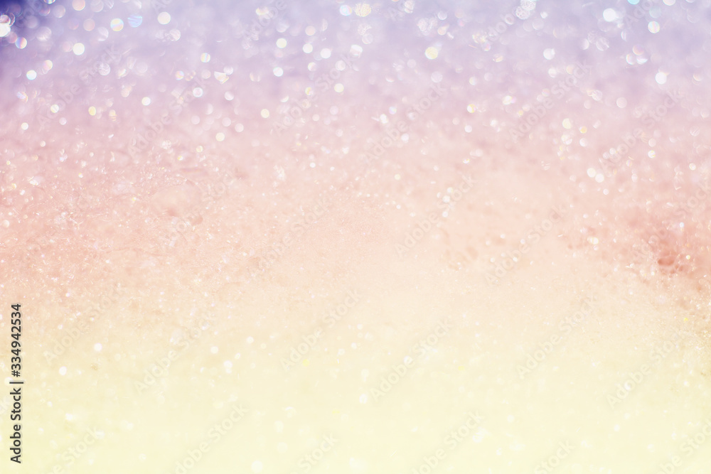 abstract white and pastel colors background of bokeh lights or bubbles in soft spring colors. Shampoo bubbles texture.