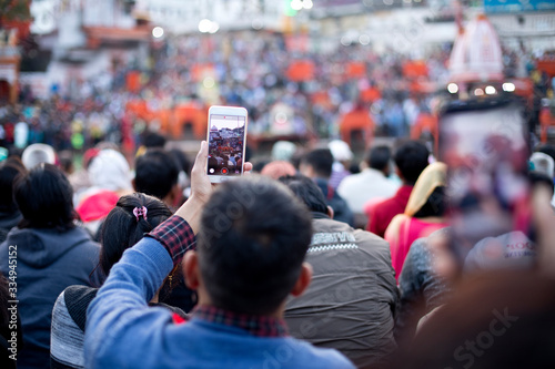 Pilgrims praying during Ganga Aarti at Har Ki Pauri