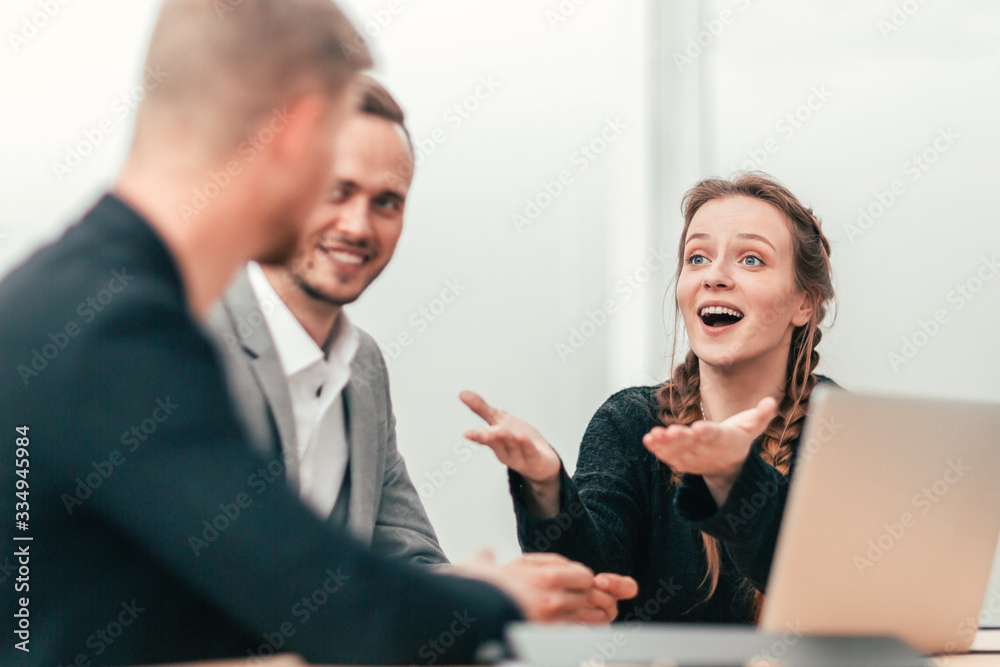 young business colleagues sitting at the office Desk young business colleagues sitting at the office Desk