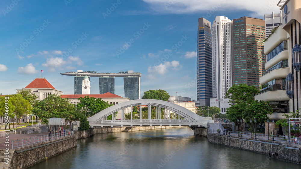 Skyline of Singapore financial district behind Elgin Bridge and the Singapore River timelapse hyperlapse Skyline of Singapore financial district behind Elgin Bridge and the Singapore River timelapse hyperlapse
