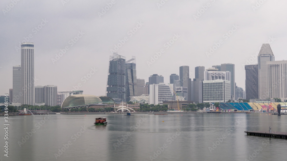 Fototapeta premium Skyline with skyscrapers of Marina Bay timelapse hyperlapse.