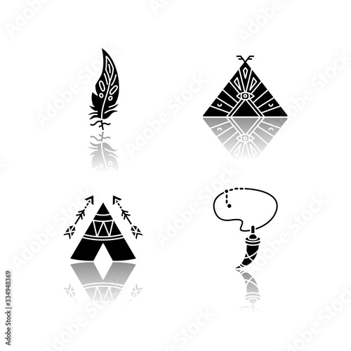 Native american indian accessories drop shadow black glyph icons set. Necklace with tooth, eagle feather. Wigwam with arrows and ethnic ornaments. Isolated vector illustrations on white space photo