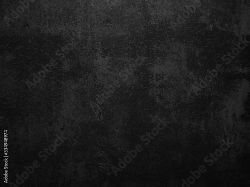 Dark concrete texture wall background. Black grunge cement wall texture for interior design. Copy space for add text.