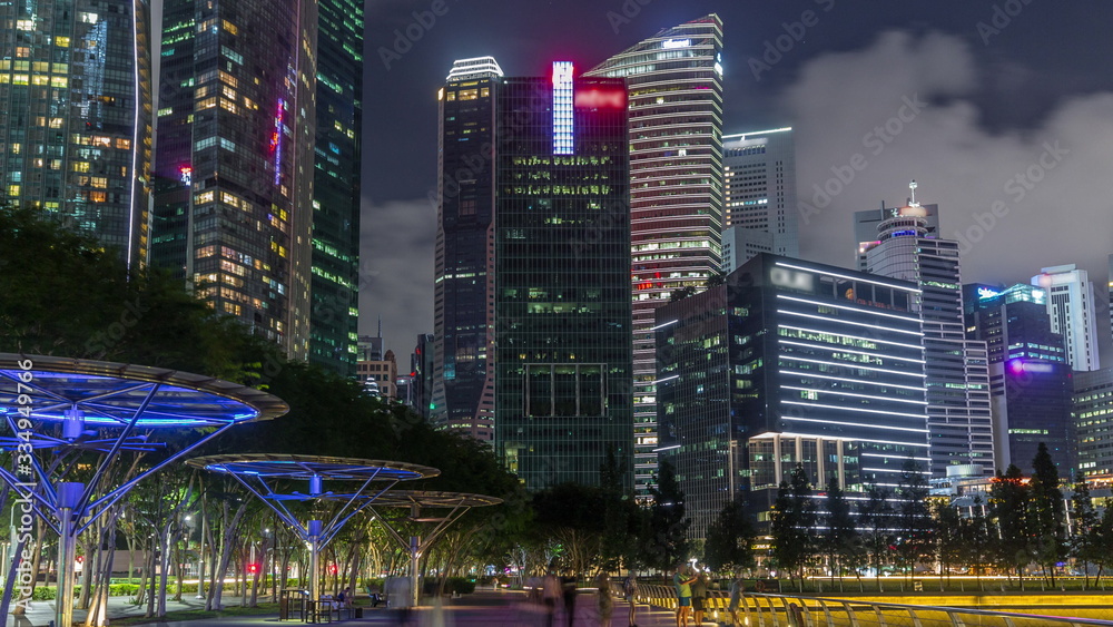 Business Financial Downtown City and Skyscrapers Tower Building at Marina Bay night timelapse hyperlapse, Singapore