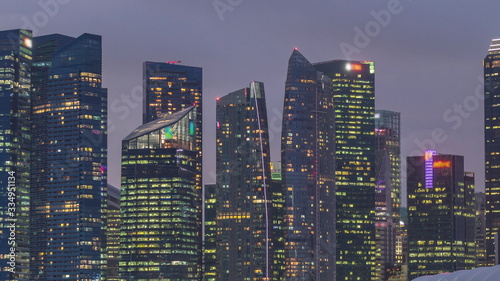 Business Financial Downtown City and Skyscrapers Tower Building at Marina Bay day to night timelapse, Singapore