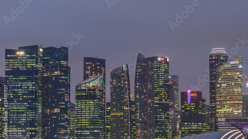 Business Financial Downtown City and Skyscrapers Tower Building at Marina Bay day to night timelapse, Singapore © neiezhmakov