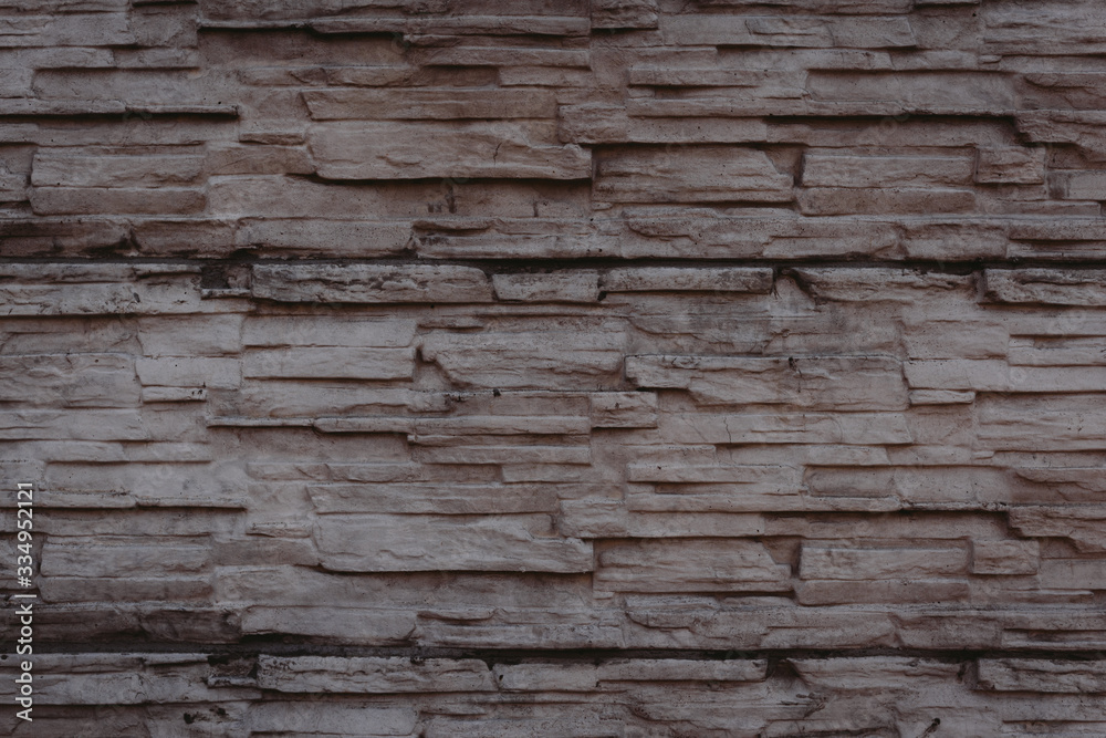 Fototapeta premium House wall element revetted with a natural stone. 