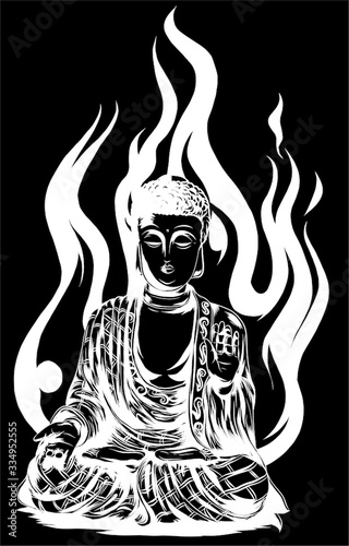 Statue of Buddha sitting in the lotus position in black background