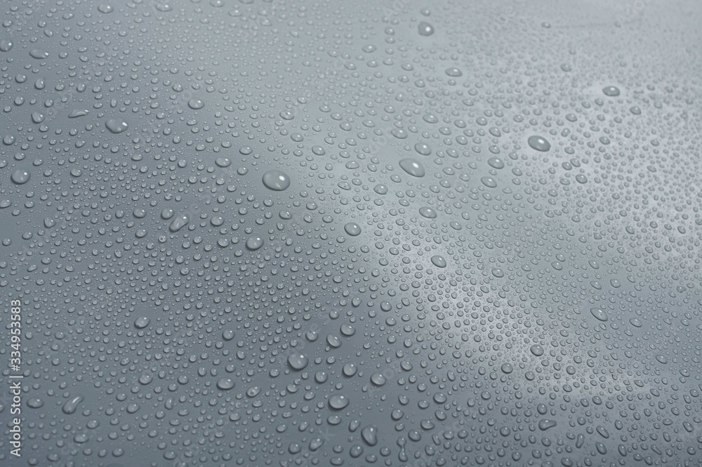 Roofing waterproofing, PVC membrane properties, close-up with water drops Roofing waterproofing, PVC membrane properties, close-up with water drops