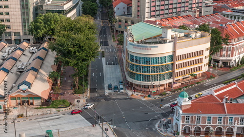 Aerial view of intersection and art deco shophouses along Neil road in Chinatown area timelapse